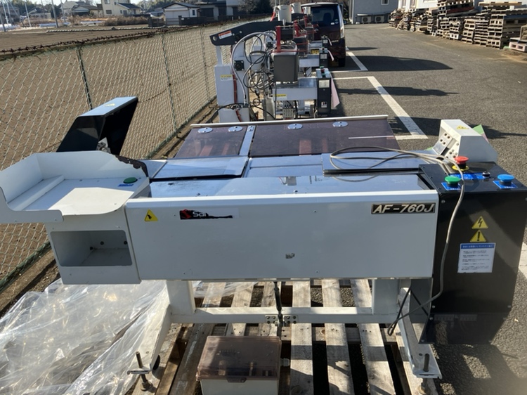 三幸社　Ｙシャツたたみ機